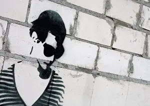Street Art Europe Drucke: Graffiti on a stone wall, Germany