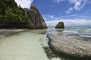 Steep Cliff Photography Drucke: Granite rocks on the beach of Anse Source dArgent