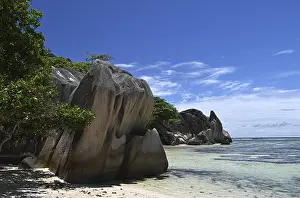 Steep Rock Face Photography Drucke: Granite rocks on the beach of Anse Source dArgent