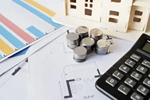 Construction Industry Finance Drucke: Graph stack coins calculator house model blueprint