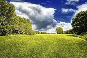 Agricultural Landscapes Photography Drucke: Green field and stormy cloud