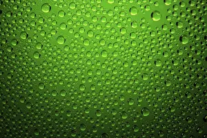 Precipitation Photography Drucke: Green water drops background close up