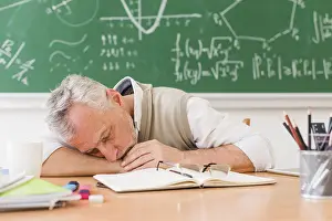 Office Work Exhaustion Drucke: Grey haired teacher sleeping table