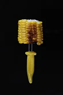 Barbecued Corn Recipes Drucke: Grilled corn on the corn cob on a corn on the cob holder