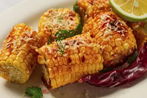 Spicy Corn Recipe Drucke: Grilled corn with spices, top view