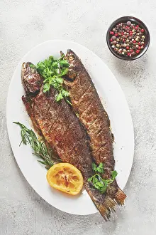 Fresh Seafood Nutrition Drucke: Two grilled fish are placed on a white dish
