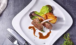 Empty Plate Food Photography Drucke: Grilled lamb chops with potatoes