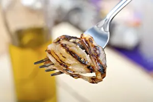 Olive Oil Nutrition Facts Drucke: Grilled onion on a fork macro close up