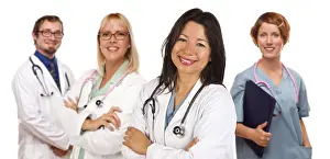 Medical Staff Isolated Drucke: Group of doctors or nurses isolated on a white background