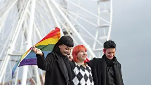 Lgbt Flag Drucke: Group non binary people with lgbt flag