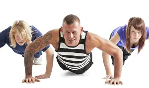 Fitness In Germany Drucke: Group of three people working out