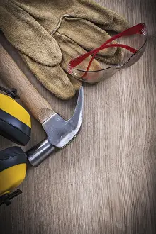 Protective Clothing Drucke: Group of safety working tools and hammer close up view