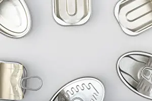 Gray Background Copy Space Drucke: Group of empty tin can isolated on a gray background