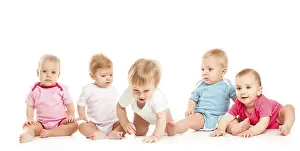 White Background Kids Drucke: Group of witty babies sitting in different clothes