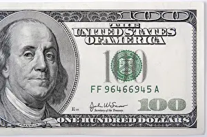 Studio Shot Of Currency Drucke: Half of a one hundred dollar bill close-up