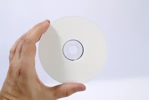 Digital Storage Drucke: Hand holding a CD