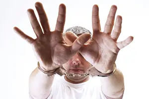 Crime Scene Photography Drucke: Handcuffed man