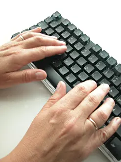 Leisure Time Activities Drucke: Hands at computer keyboard