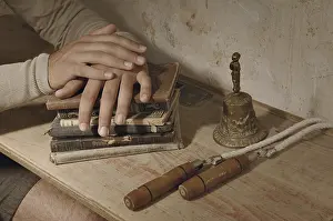 Educational Institution Image Drucke: Hands on stack of books, historic school setting