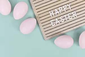 Christian Holiday Tradition Drucke: Happy Easter text on letter board with Easter eggs
