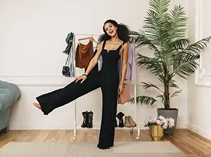 Studio Photography Drucke: Happy stylist posing in studio
