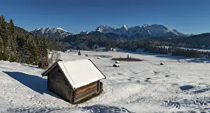 Upper Bavaria Winter Scene Drucke: Haystack in snow-covered landscape