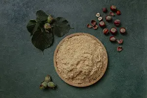 Nut Meal Powder Drucke: Hazelnut flour, top view, filbert