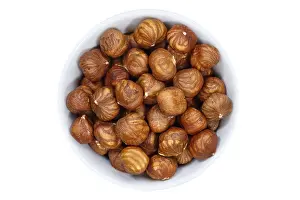 Nut Nutrition Facts Drucke: Hazelnuts nuts from above crop on a white background