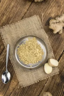 Medicinal Plant Images Drucke: Some healthy Ginger Powder (selective focus)