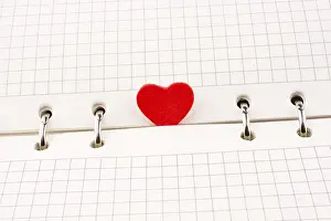 Symbolic Heart Image Drucke: Heart on a checked notebook