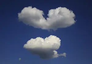 Empty Heart Symbol Image Drucke: Heart-shaped clouds in the sky
