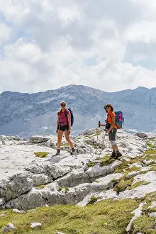 Hiking In The Alps Drucke: Two hikers look into the camera