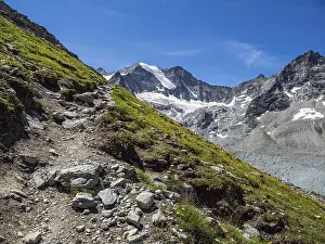 Valais Switzerland Drucke: Hiking path up to mountain hut Cabane de Moiry