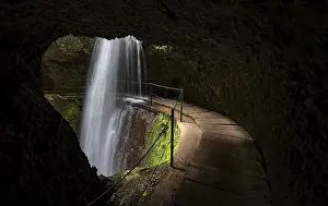 Motion Blur Waterfall Drucke: Hiking trail behind waterfall at Levada Nova