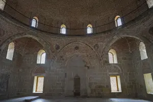 Western Asia Defence Work Drucke: Historic interior with brick dome and windows that diffuse soft light into the room