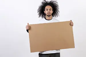 White Studio Background Portrait Drucke: Holding a sign with copy paste space