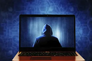 Data Security Protection Drucke: A hooded mysterious hacker figure inside a laptop screen displaying binary code