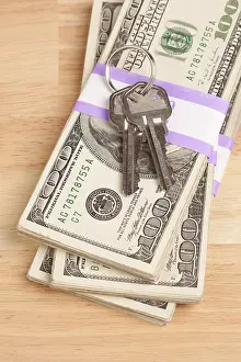 Cash For Keys Program Drucke: House keys on stack of money, cash for keys program