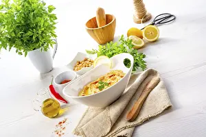 Lemon And Chilli Hummus Drucke: Hummus paste with lemon and chilli on a white background
