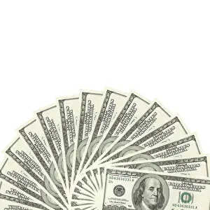Deserted Cash Pile Drucke: Hundreds of dollars spread on white background
