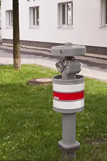 Deserted Residential House Drucke: Hydrant, opened, at a residential building