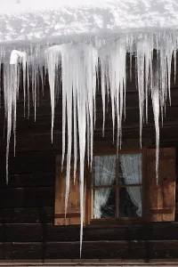 Europe Winter Landscape Photography Drucke: Icicles in front of a window