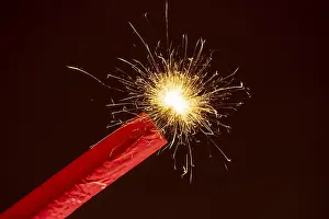 Deserted Fire Scene Drucke: Ignited firework, firecracker, firecracker with burning fuse