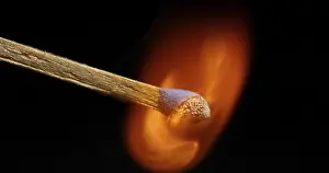 Black Background Photography Drucke: Igniting Match against Black background