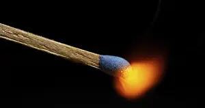 Deserted Night Scene Drucke: Igniting Match against Black background