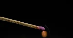 Black Background Flame Drucke: Igniting Match against Black background