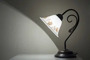 No People In The Room Drucke: Illuminated Lamp on a Table