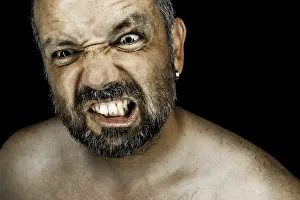 Self Confident Male Drucke: An image of an angry man with a beard