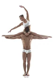 Studio Posing Drucke: Image of attractive acrobats posing in studio