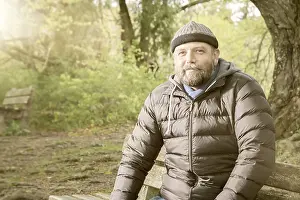 Handsome Bearded Guy Drucke: An image of a bearded man winter jacket